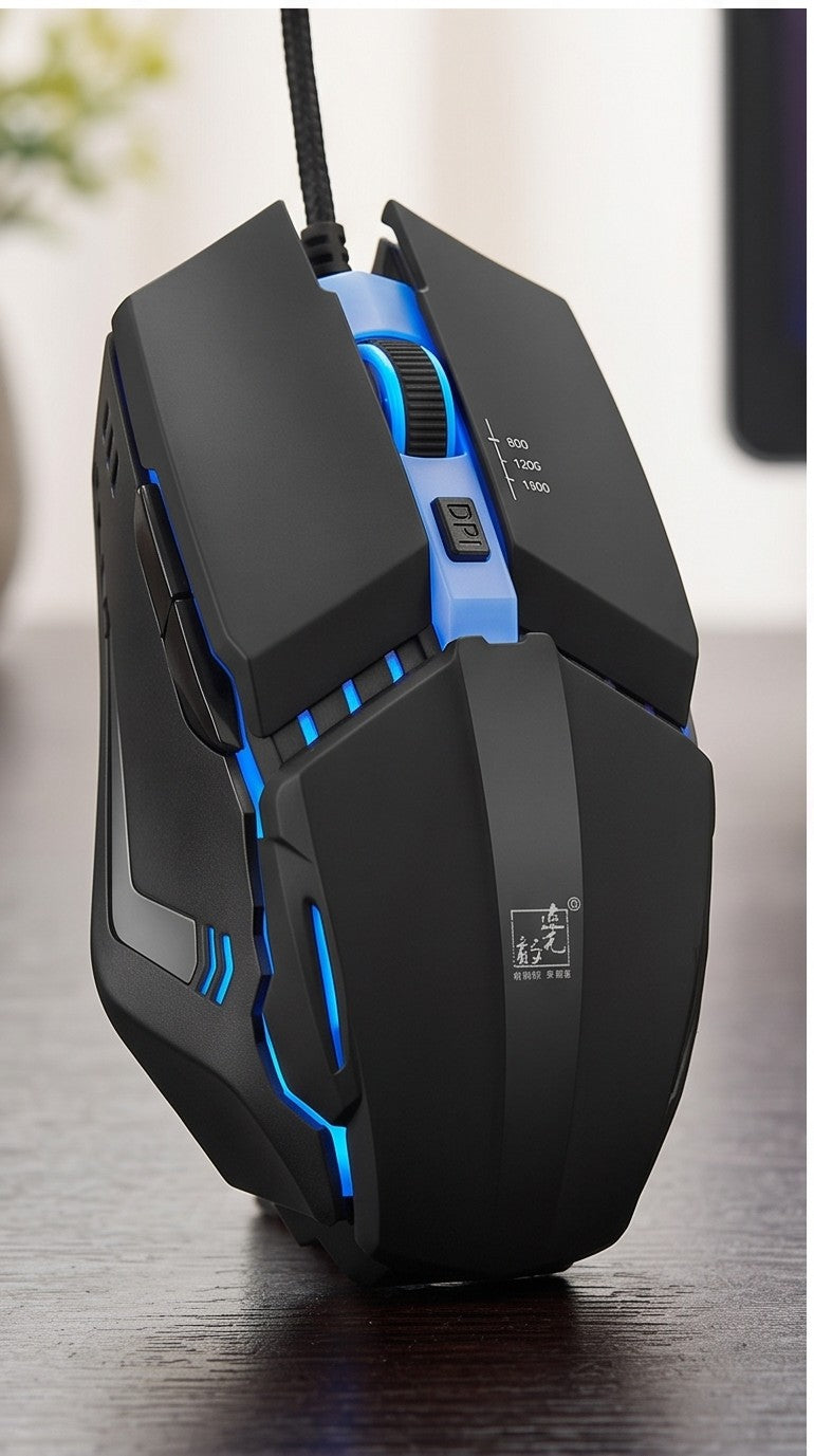 Black gaming mouse with blue accents on a wooden surface